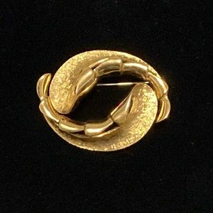Monet gold-tone brooch